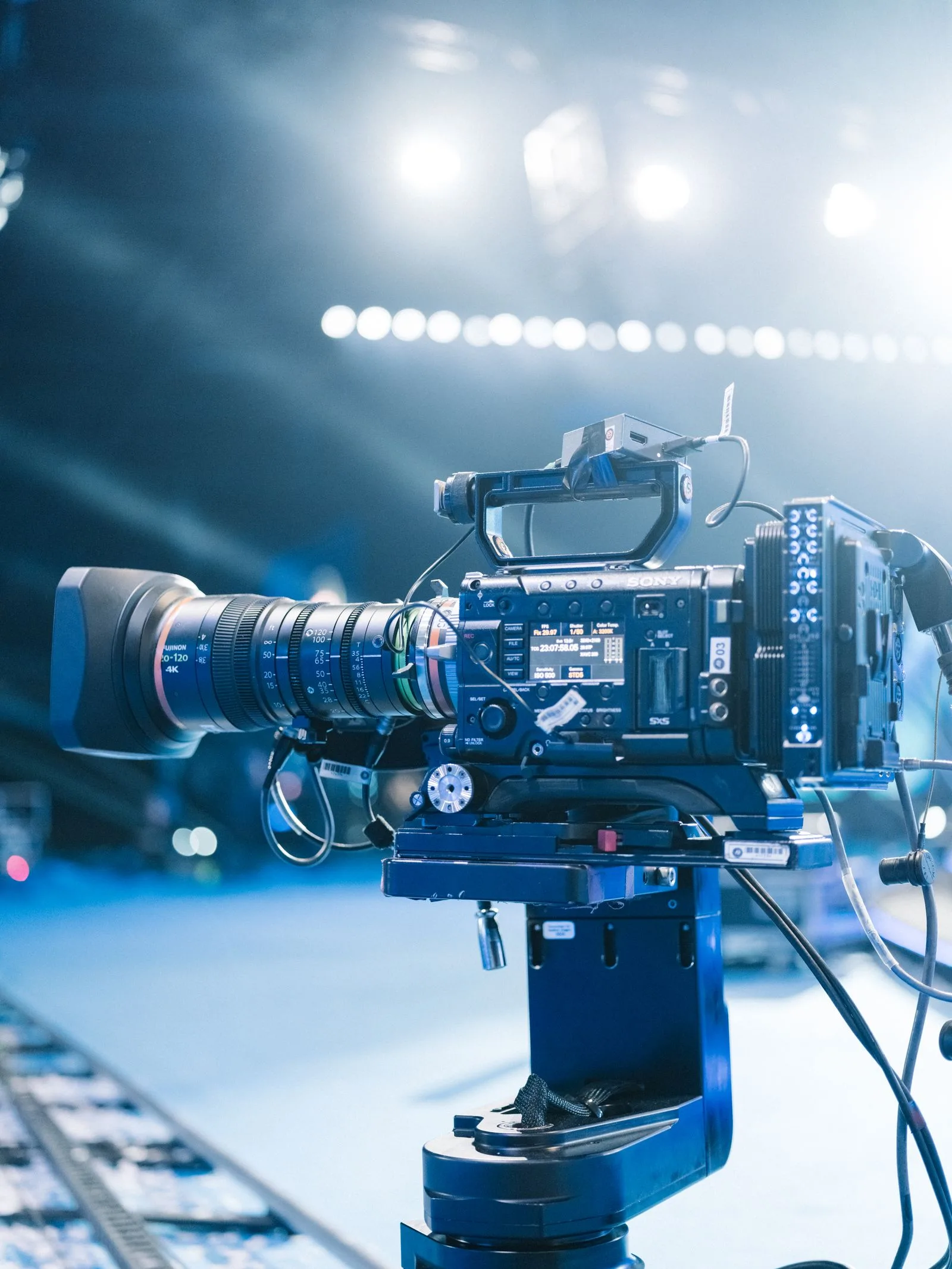 A professional broadcast camera on a studio set